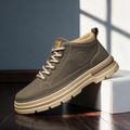 Langley Cushioned Chukka Boot in khaki, side view on a wooden floor