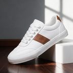 Sullivan Court Sneakers in white with cognac stripe, side view on a wooden floor